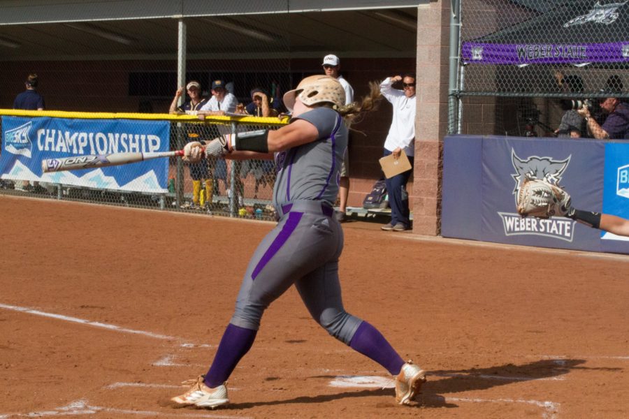 #3 Payton Hergert hitting for the wildcats. (Sara Parker / The Signpost)