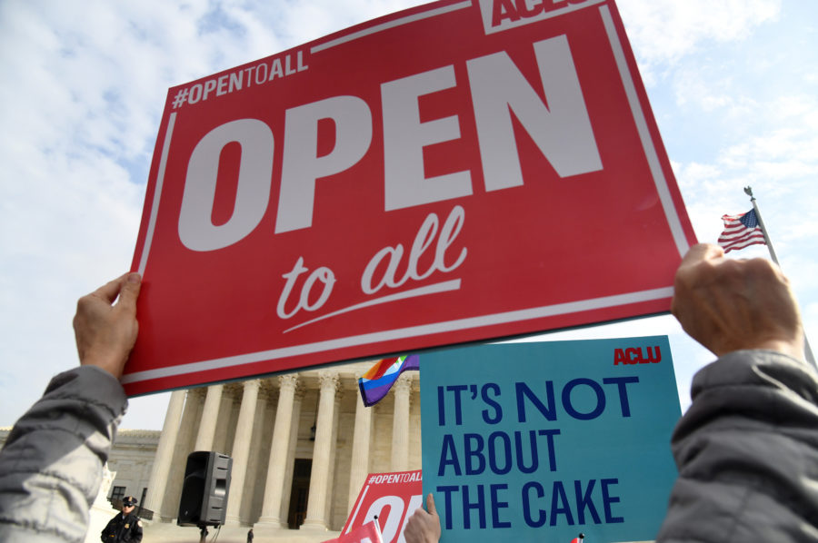 Protesters gather in front of the Supreme Court building on the day the court is to hear the case Masterpiece Cakeshop v. Colorado Civil Rights Commission on Dec. 5, 2017, in Washington, D.C. (Olivier Douliery/Abaca Press/TNS)