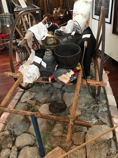 A preserved pioneer handcart sits on display at the Weber County Daughters of Utah Pioneers Museum.