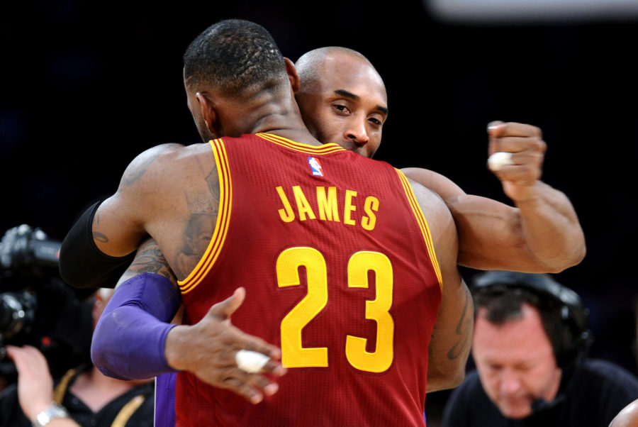 Kobe Bryant hugs LeBron James, then of the Cavaliers before the start of play at Staples Center in 2016. James announced that he will join the Lakers for the 2018 season. (Wally Skalij/Los Angeles Times/TNS)