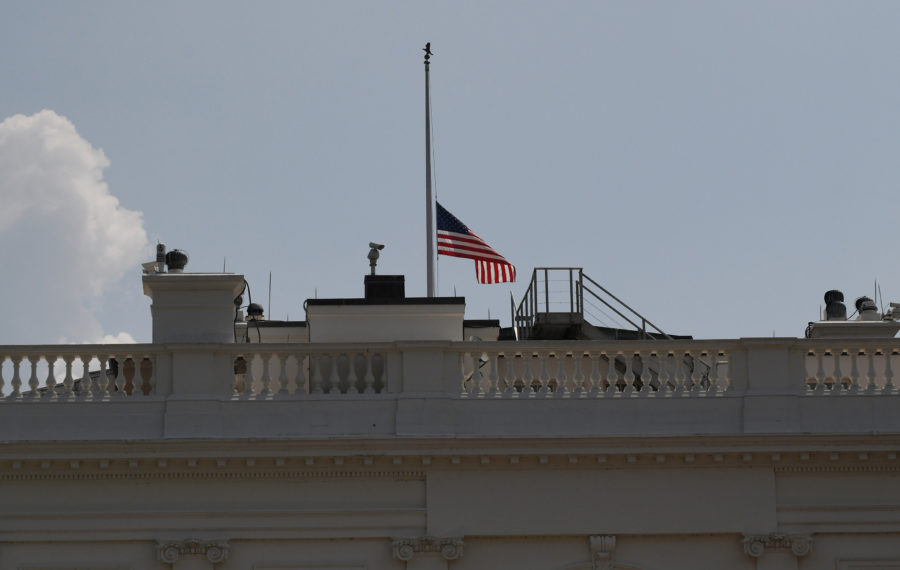 The  U.S. flag is lowered to half-staff  at the White House on July 3, 2018 after President Donald Trump ordered it as a mark of solemn respect for the four journalists and a newspaper sales representative killed last week at the Capital Gazette newsroom in Annapolis, Md. (Olivier Douliery/Abaca Press/TNS)