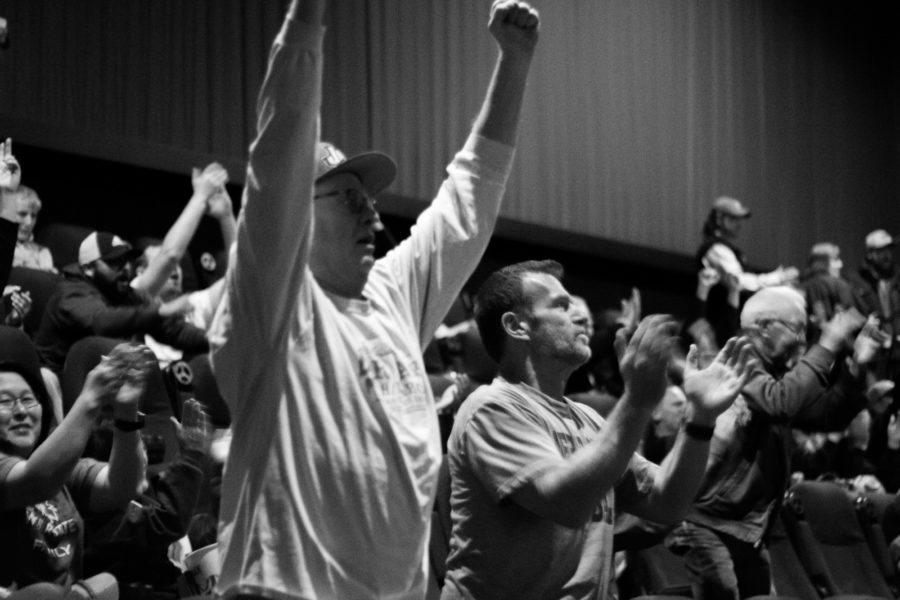 Fans cheering on the wildcats at the mens football Weber State vs James Madison screening at Megaplex Theaters (Signpost Archives)