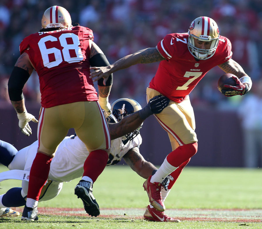 San Francisco 49ers quarterback Colin Kapernick (7) is sacked by St. Louis Rams defenseman Michael Brockers during the first quarter of their game at Candlestick Park in San Francisco, Sunday, Dec. 1, 2013.  (Aric Crabb/Bay Area News Group/MCT)