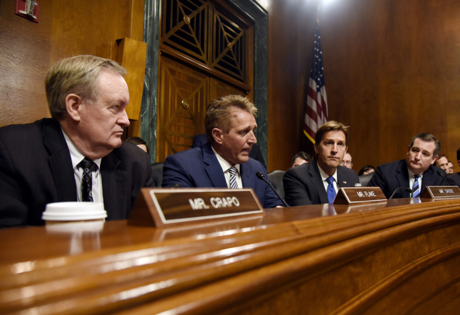 Sen. Jeff Flake (R-Ariz.), second from left, speaking during a Senate Judiciary Committee hearing in Washington, D.C., on Sept. 28. (Olivier Douliery/Abaca Press/TNS)