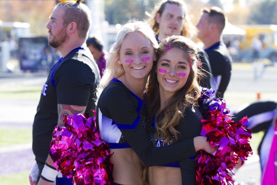 Weber State cheerleaders supporting breast cancer awareness (Sara Parker / The Signpost)