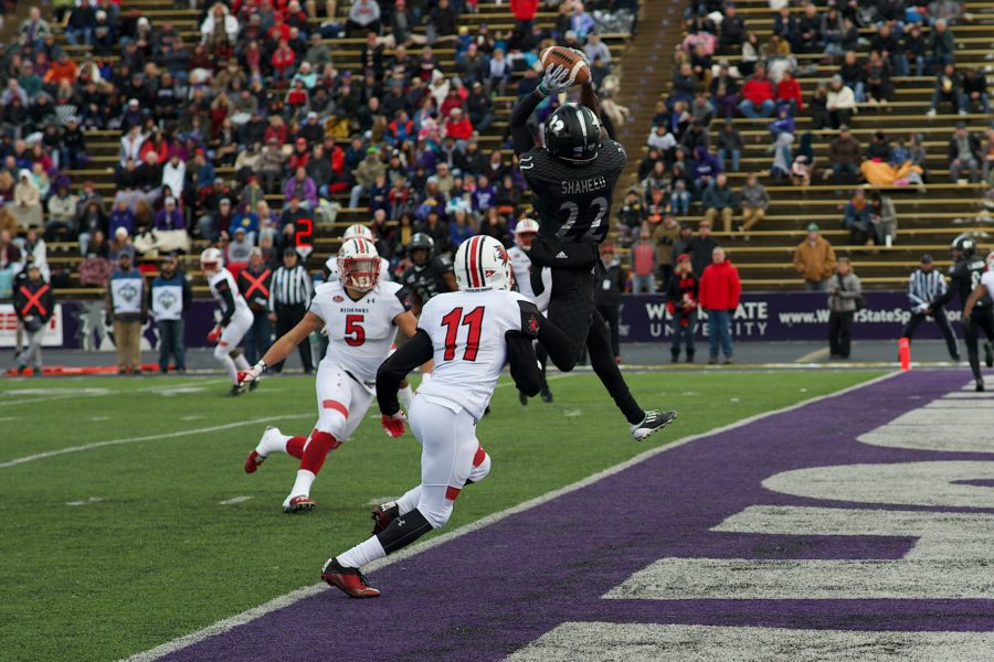 Shaheed leaps for the ball, catching it for a touchdown. (Joshua Wineholt / The Signpost)