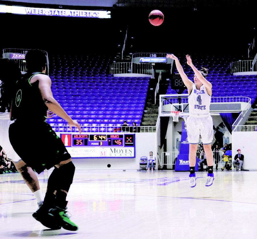 Wide open, junior Kailie Quinn shoots for three points Jan 19 against North Dakota. (Abby Van Ess /The Signpost)