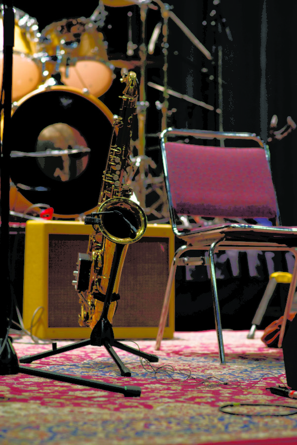 Joe McQueens saxophone sits waiting for him before the show. (Joshua Wineholt / The Signpost)