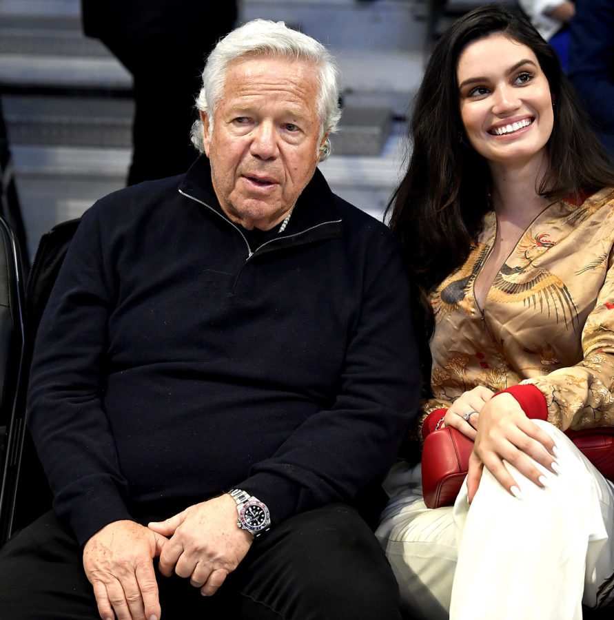 New England Patriots owner Robert Kraft, left, sits courtside during the pre-game festivities prior to the NBA All-Star Game at Spectrum Center in Charlotte, North Carolina on Feb 17. (Jeff Siner/Charlotte Observer/TNS)