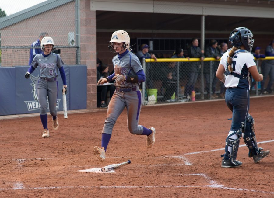 Outfielder Landi Hawker finds her way to homeplate. (Joshua Wineholt / The Signpost)