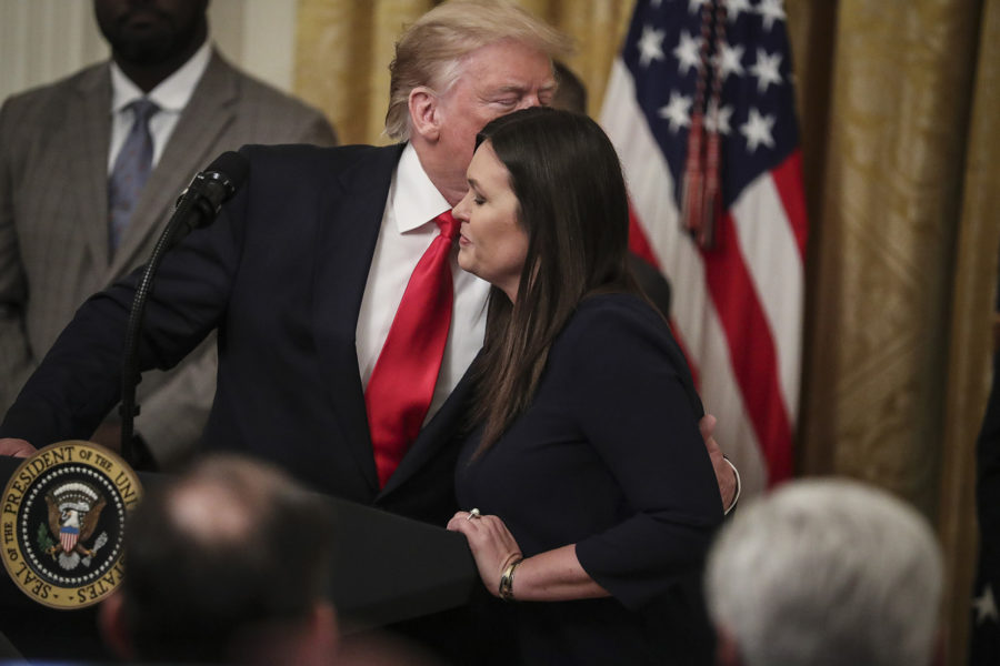 Outgoing White House Press Secretary Sarah Huckabee Sanders hugs President Donald Trump during a second chance hiring and criminal justice reform event in the East Room of the White House in Washington, DC, on June 13, 2019. (Oliver Contreras/SIPA USA/TNS)
