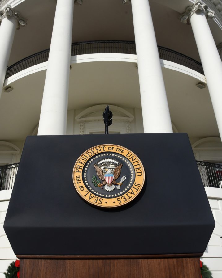 The Presidential Seal is seen on the podium prior to President Donald Trump speaking about the passage of tax reform legislation on the South Lawn of the White House on Dec. 20, 2017, in Washington, D.C. (Olivier Douliery/Abaca Press/TNS)