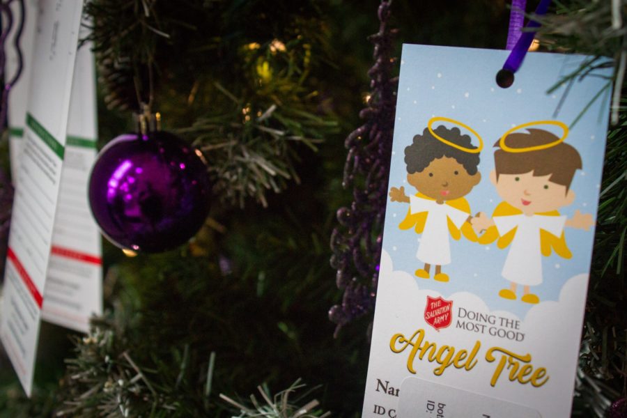 Each of the Angel Tree cards that are hanging on the Christmas tree in the CCEL office correspond to a recipient of the programs holiday donations. (Kalie Pead/ The Signpost)