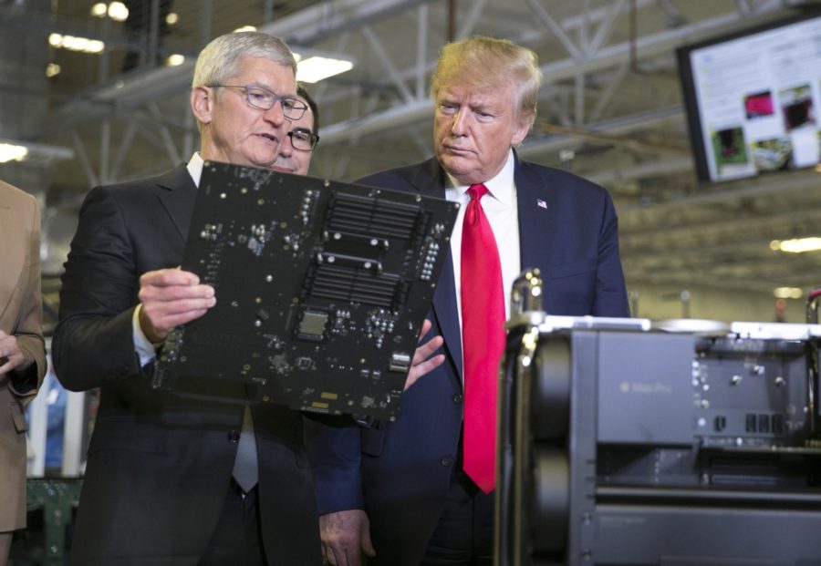 President Donald Trump and Apple CEO Tim Cook tour the Flextronics plant in Northwest Austin on Wednesday. [Jay Janner/ American Statesman]