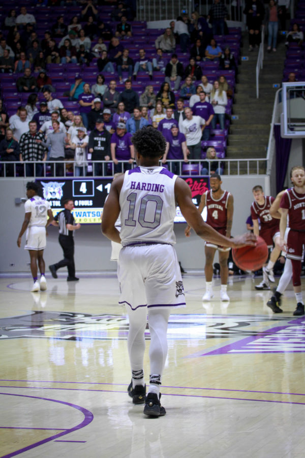 Weber State guard, Jerrick Harding, takes the ball down the court after a successful play. (Kalie Pead/ The Signpost)