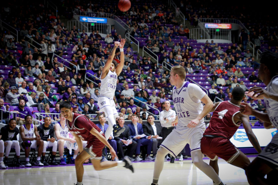 Weber State team member, Cody John, takes a shot near the edge of the court. (Kalie Pead/ The Signpost)