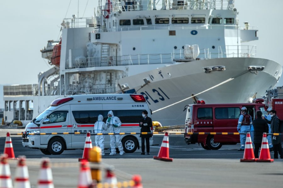 An ambulance carries a coronavirus victim from the Diamond Princess cruise ship while it is docked at Daikoku Pier in Yokohama, Japan.(Carl Court/Getty Images/TNS)