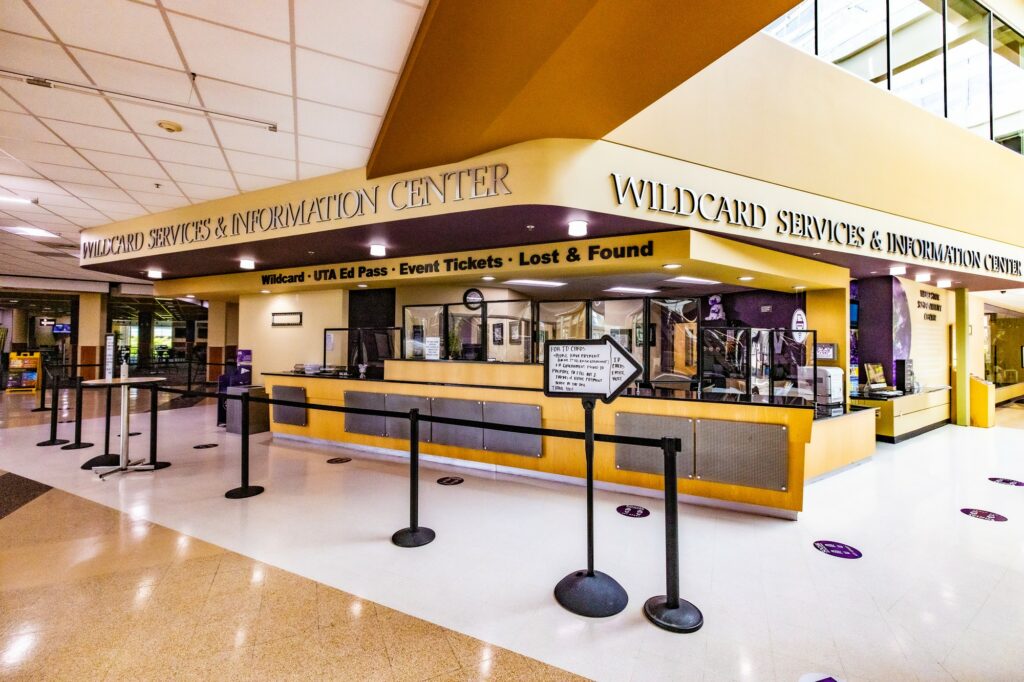 Wildcard Services and Information Center has plexiglass installed and stickers on the floor for students to practice social distancing on campus. It is located inside the Shepard Union. (Robert Lewis / The Signpost)