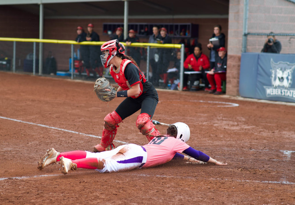 Wildcat Faith Hoe slides home. (Signpost Archives)