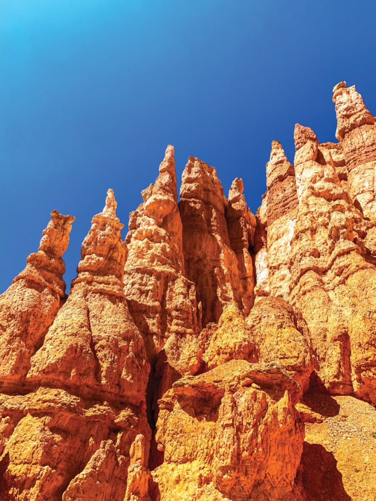 Hoodoos tower over you as you walk beneath them. (Israel Campa/The Signpost)