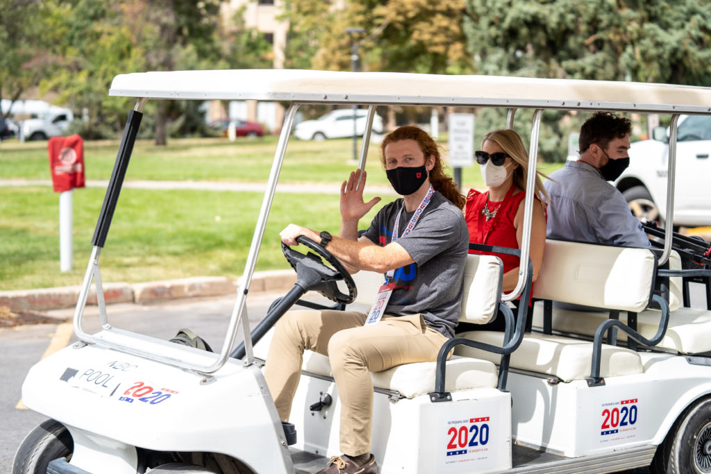 Student Volunteers drive media around the University of Utah Campus for coverage on the Oct. 7 VP Debate.