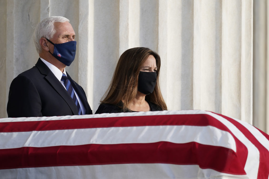 Vice President Mike Pence and second lady Karen Pence pay respects as Justice Ruth Bader Ginsburg lies in repose under the Portico at the top of the front steps of the Supreme Court building on September 23, in Washington, D.C. (Alex Brandon/Pool/Sipa USA/tns)