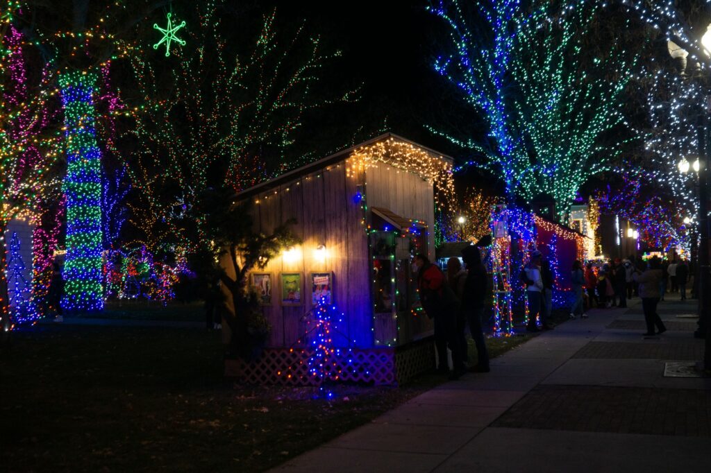 The Municipal Gardens are full of Christmas lights and small houses. (Israel Campa / The Signpost)