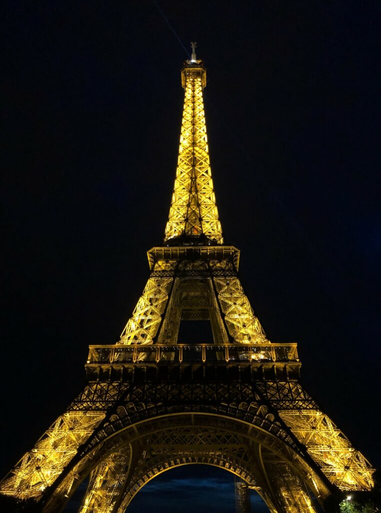 The Eiffel Tower fully lit up at night in June. (Paige McKinnon / The Signpost)