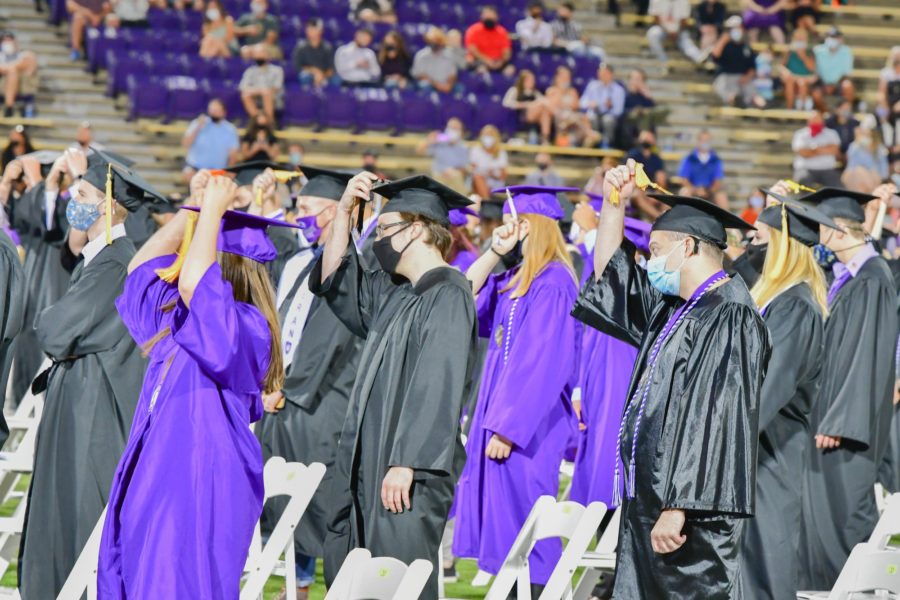 Graduates are asked to move their tassels from right to left as a symbol of the completion of their degree.  (Nikki Dorber / The Signpost)