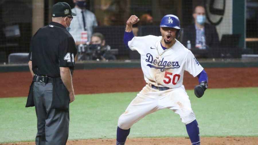 The Los Angeles Dodgers Mookie Betts reacts after scoring in the sixth inning in Game 6 of the 2020 World Series.