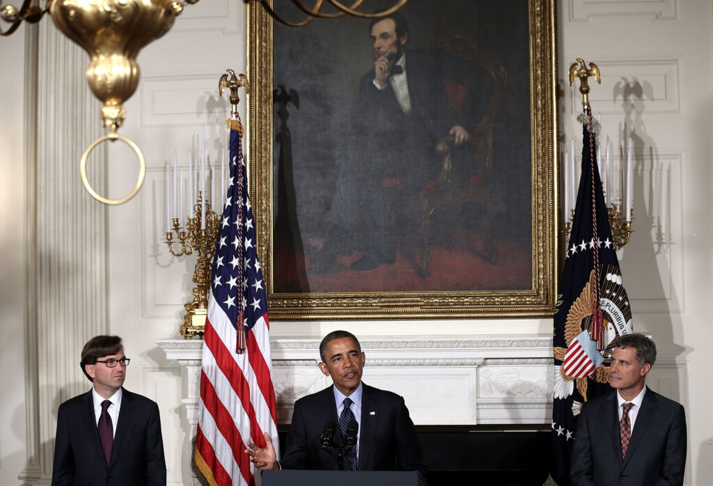 U.S. President Barack Obama speaks as chairman of the Council of Economic Advisers Alan Krueger, right, and economist Jason Furman listen during a personnel announcement in the State Dining Room of the White House in June 2013. In 2012, Krueger introduced the Great Gatsby curve, a graph that showed that the more inequality that exists between the rich and the poor, the harder it is for low-income people to climb up the socioeconomic ladder. (Alex Wong/Abaca Press/TNS)