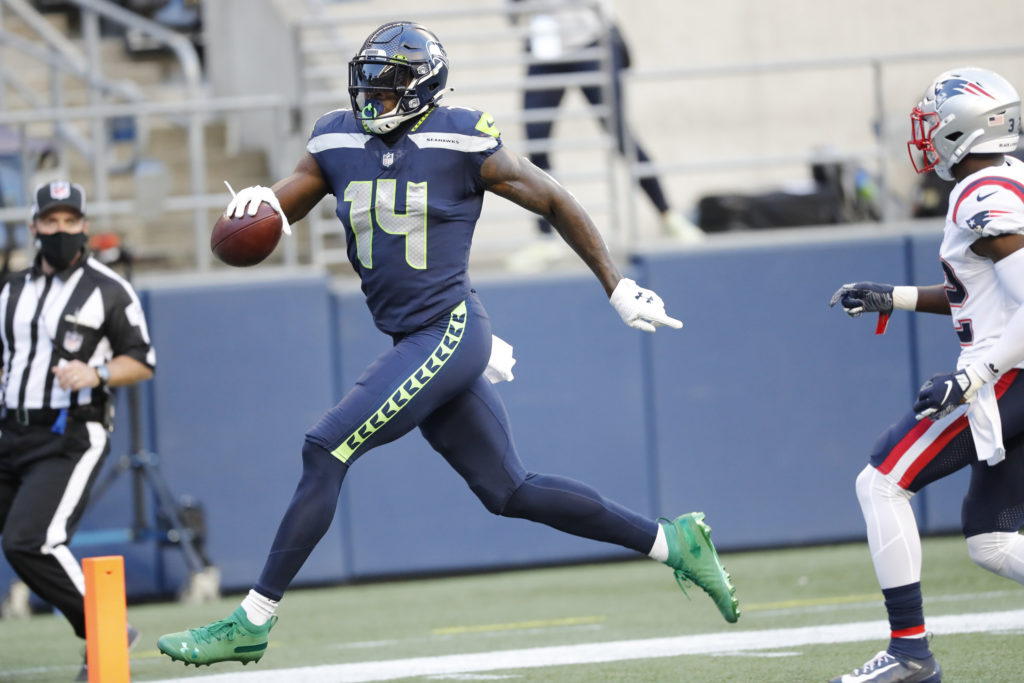 Seattle Seahawks wide receiver D.K. Metcalf catches a 54-yard pass and runs in for a touchdown in a game against New England Patriots on Sunday, September 20, 2020, at CenturyLink Field in Seattle, WA.