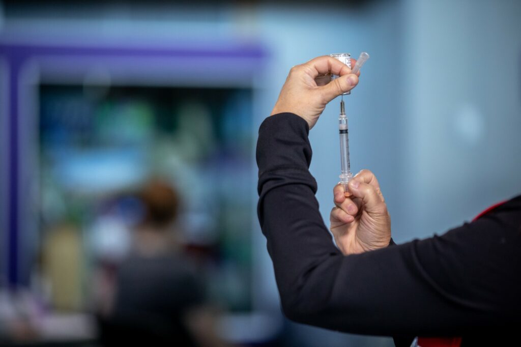 The Weber-Morgan Health Department begins offering COVID-19 vaccinations in a temporary clinic in the Dee Events Center at Weber State University in Ogden on January 5, 2021. Healthcare workers in non-hospital settings are the first priority group to participate in the invitation-only clinics. (Weber State University)