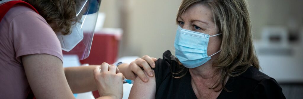 The Weber-Morgan Health Department begins offering COVID-19 vaccinations in a temporary clinic in the Dee Events Center at Weber State University in Ogden on January 5, 2021. Healthcare workers in non-hospital settings are the first priority group to participate in the invitation-only clinics. (Weber State University)