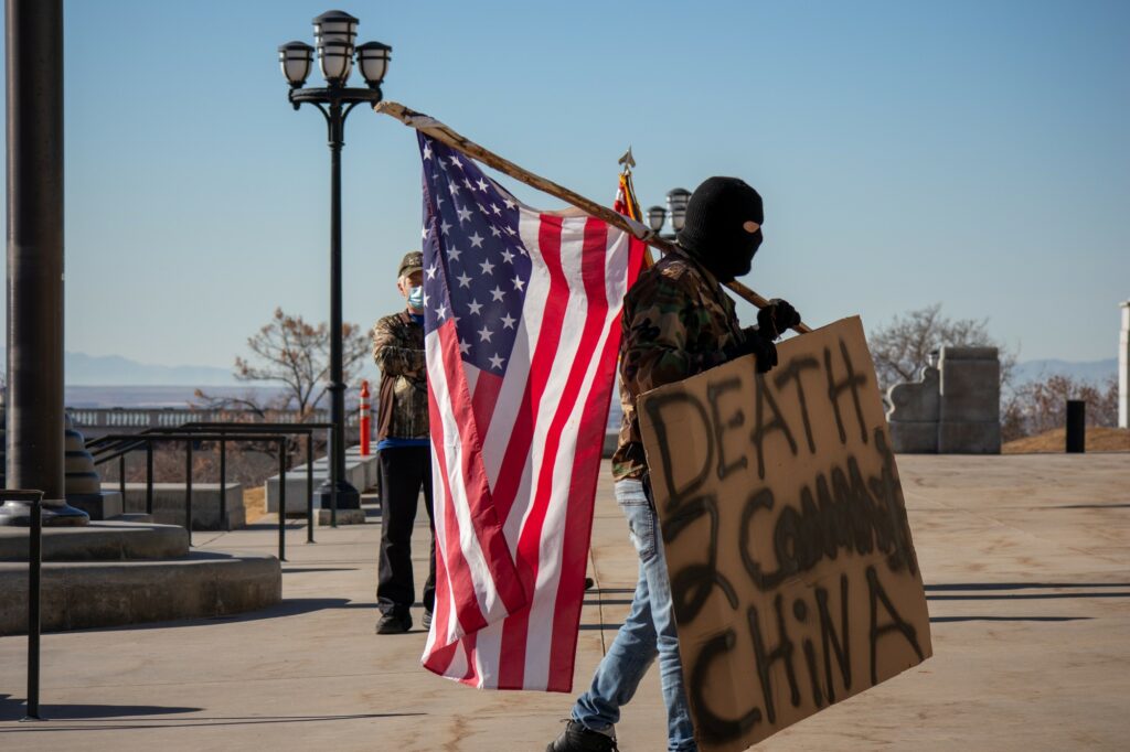 Protestor standing at the steps of Utah's Capitol after inauguration of President Joe Biden. (Sarah Earnshaw/ The Signpost)