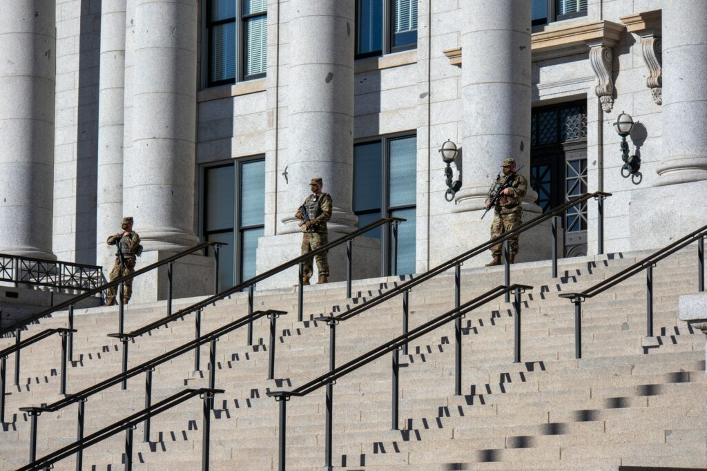 National Guard stands atop Utah Capitol's steps. (Sarah Earnshaw/ The Signpost)