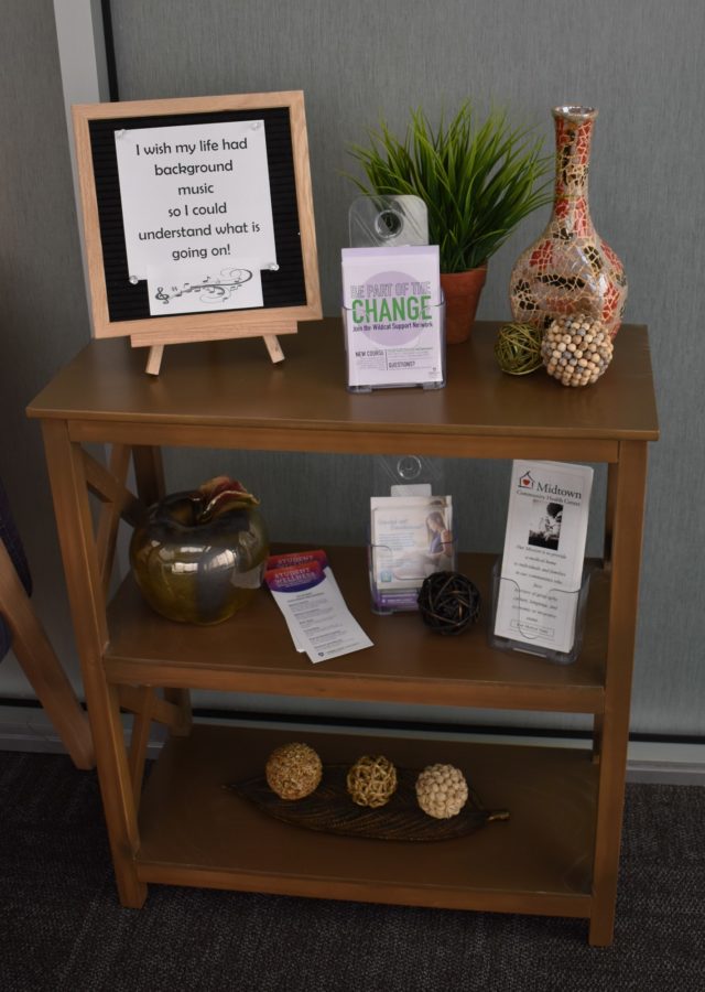 Multiple plants and flyers are on display for student viewing within the Counseling and Psychological Services Center. (Paige McKinnon/The Signpost)