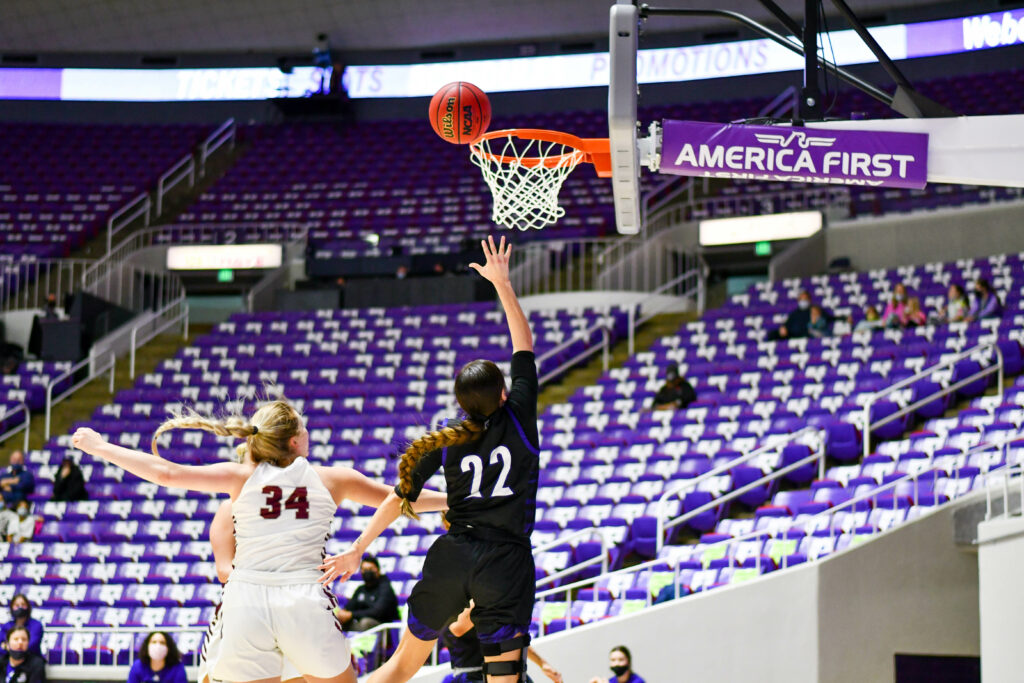 Weber State's gaurd, Aloma Solovi giving WSU the lead with a lay-up.  Lady Wildcats hosts the Feb. 13 game against Montana's Griz.  Nikki Dorber / The Signpost