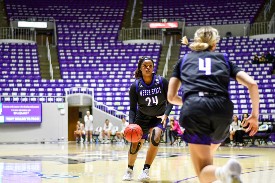 Weber States Dominique Williams setting up to shoot one of many 3-point baskets on Feb. 13 against Montanas Griz.  (Nikki Dorber / The Signpost)