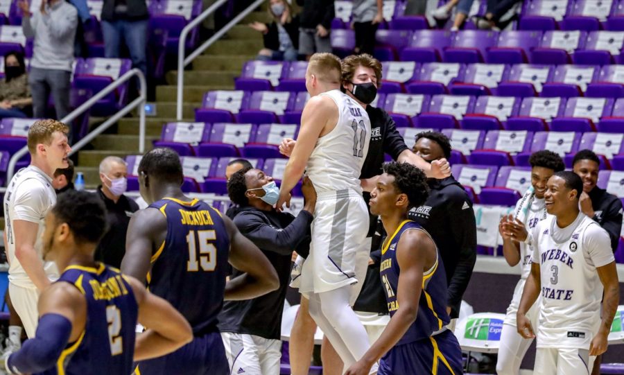 Michal Kozak celebrating with his teammates after the win. Photo credit: Weber State Athletics