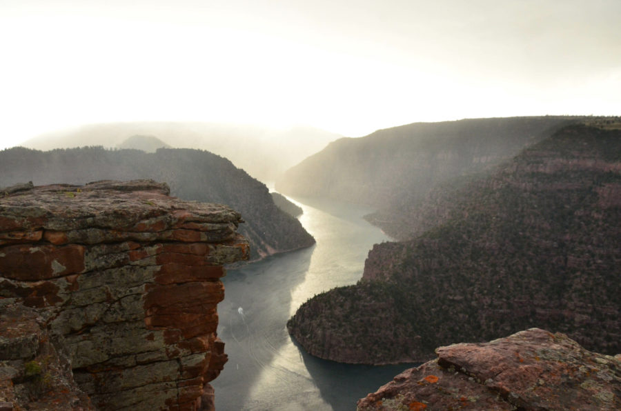 The cliffs of Flaming Gorge, Utah above an outlet become hidden by a fog.  (Nikki Dorber/The Signpost)