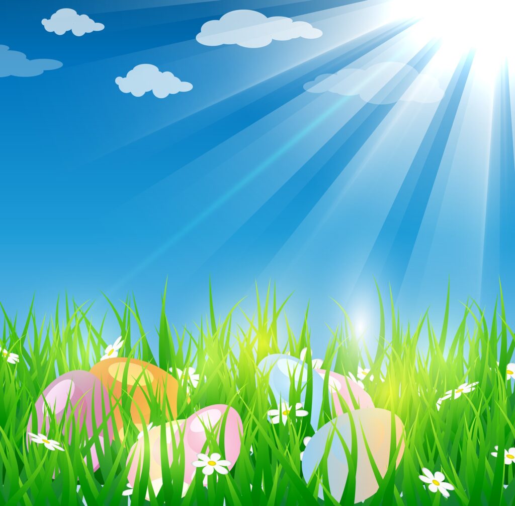Easter eggs laying in a grassy area. Image from Pixabay