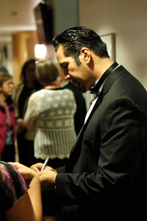 Tau Pupua giving time to his audience before his 2011 performance at the Browning Center. Photo credit: Weber State University