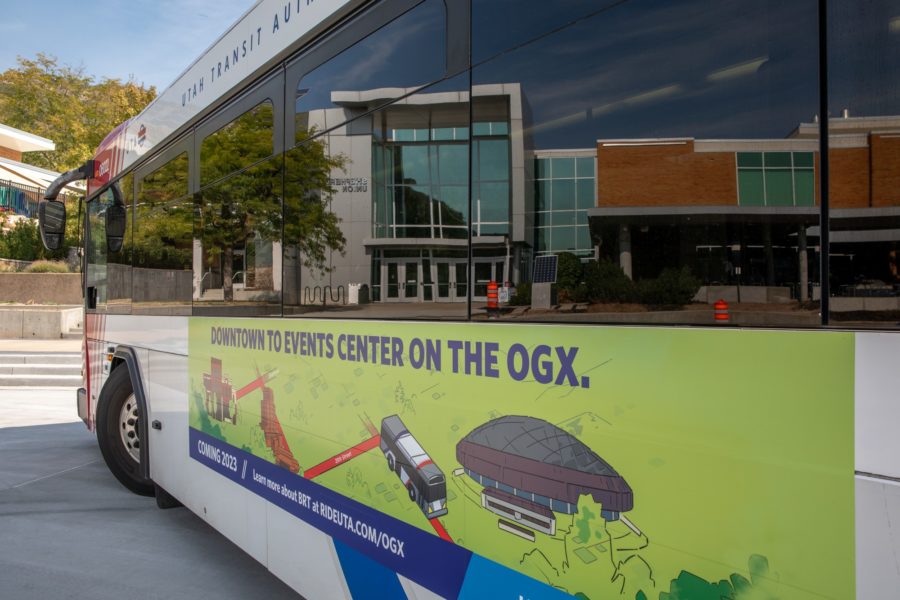 A new ad showing the new name of the BRT, now known as OGX, is featured on the side of a UTA bus. Photo credit: Weber State University