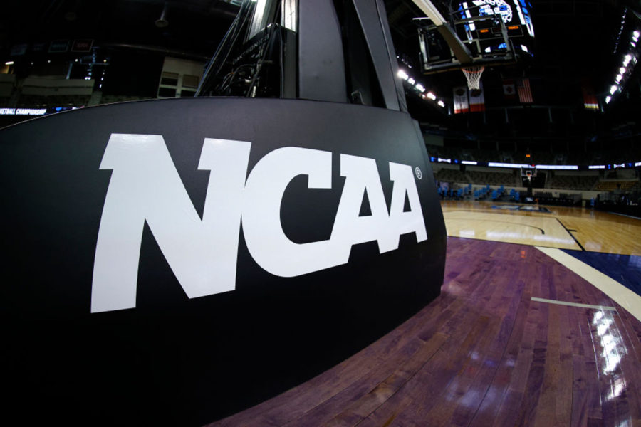 The NCAA logo is seen on the basket stanchion before the game between the Oral Roberts Golden Eagles and the Florida Gators in the second round game of the 2021 NCAA Mens Basketball Tournament at Indiana Farmers Coliseum on March 21, 2021, in Indianapolis, Indiana. (Maddie Meyer/Getty Images/TNS)