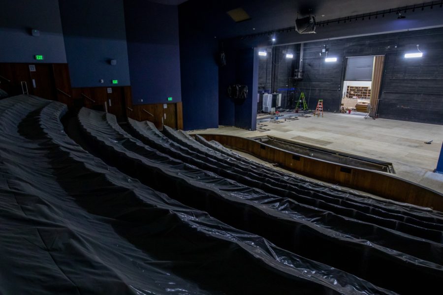 Crews install a new stage floor and orchestra pit in the Allred Theater in the Browning Center for the Performing Arts on July 6, 2021. Photo credit: Weber State University