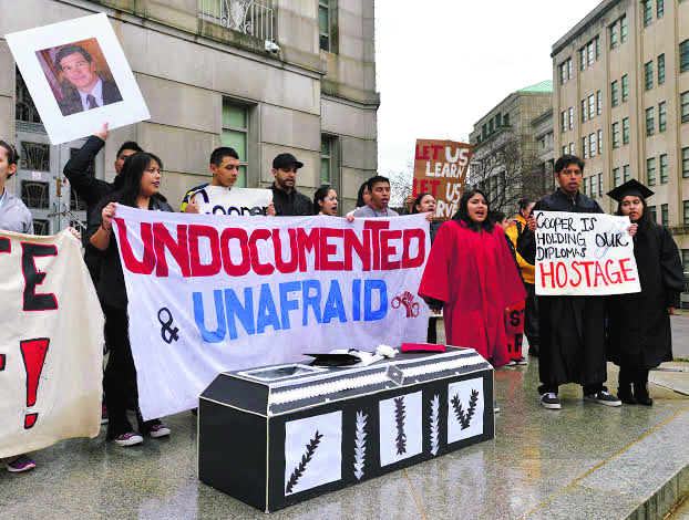 Immigration activists made a trip from Chapel Hill to Raleigh to protest slience from North Carolina Attorney General Roy Cooper on whether undocumented students are eligible for in-state tuition on Jan. 11, 2014. (Chuck Liddy/Raleigh News & Observer/MCT)
