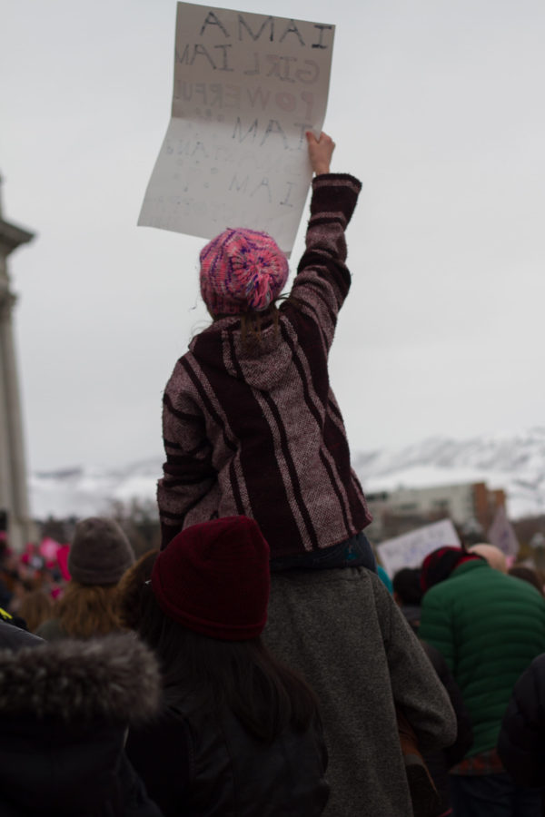 A young girl makes her voice heard at a womens march rally. (The Signpost Archives)