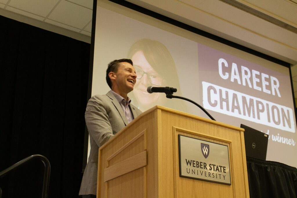 President of Weber State University Brad Mortensen, welcomes the audience at the career champions recognition banquet. (Kennedy Robins/ The Signpost)
