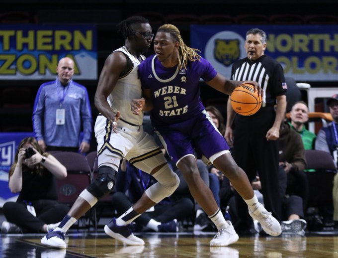 Dontay Bassett pushes against the defense for the Wildcats. Photo credit: Weber State Athletics